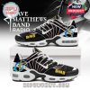 Side view of Dave Matthews Band sneakers placed on box, with standout DMB text and dancing figure detail!