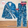 Detroit Lions-themed pajama set in vibrant blue, decorated with floral elements and team branding, includes a personalized name area on the shirt and matching pants for comfortable fanwear!