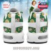 Rear view of Christmas-themed Elf sneakers with cookies, characters, and playful green base!
