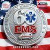 EMS coin in silver color with detailed anniversary engravings, American flag background, and symbols honoring six decades of service!