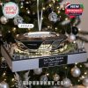 Las Vegas Raiders stadium ornament celebrating the 65th anniversary of the team, decorated with Christmas lights.