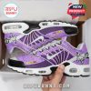 Side view of anime-themed sneakers inside box with Dragon Ball visuals and purple color scheme!