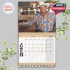 June page of George Strait’s 2026 calendar with a rustic bar backdrop and charming expression!