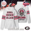 A white team hoodie with Georgia Bulldogs branding on the front and a statement skull football helmet graphic on the back!