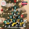 Football-themed Christmas ornament featuring Packers players in iconic green and yellow, arranged in a pyramid with a trophy replica and red ribbon for hanging!