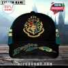Eagles x Hogwarts black cap with green and yellow side striping, Hogwarts crest, broomstick artwork, and team logo.