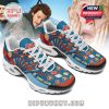 Home Alone themed sneakers with colorful graphics of Kevin and movie references on a blue and red shoe design.