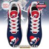 Overhead view of Texans Christmas sneakers with festive toe graphic and detailed lacing!