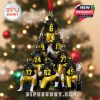 Christmas ornament with Iowa players in black and yellow gear stacked in a pyramid formation, featuring a red hanging loop and a championship trophy replica at the bottom!