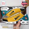Jaguarsmas sneakers in packaging with bold yellow upper, holiday logo, and swoosh detailing!