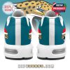 Back angle of Jaguars Christmas sneakers with teal heel and KC logo in holiday design!