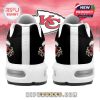 Backside of Chiefsmas sneakers with black heel area and KC holiday logo design!