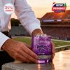 Kansas State Wildcats purple whiskey glass positioned at the stadium edge with field and sunset in the background!