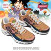 Krillin-themed sneakers with orange and blue tones, anime sketches across the upper, white laces, and Dragon Ball logos!