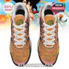 Detailed top view showing Dragon Ball symbols, white laces, Shenron graphic on tongue, and anime patterns across the toe!