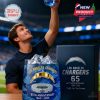 A joyful fan holds up a special edition Chargers whiskey glass under stadium lights, emphasizing its connection to live football experiences!