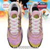 Bird’s-eye view of Dragon Ball TN sneakers with white laces, Shenron logo, and anime sketch patterns across the pink and purple upper!