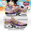 Side angle of anime sneakers in pink and yellow with character artwork, Dragon Ball logo, and Nike-style cushioning sole!