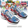 Holiday-themed sneakers in red and blue with Mario in Santa costume, snowflakes, coins, and festive illustrations for a cheerful Christmas vibe!