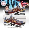 Elvis Presley-inspired sneakers featuring bold colors and detailed memorabilia visuals, resting on a box with a concert-themed poster in the background!