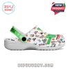 Right view of the Christmas clog decorated with cute festive prints, a snowflake-detailed green strap, and white supportive sole!