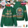 Green hoodie with Miami Hurricanes logo on front and skull helmet graphic on back with the phrase 