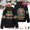 Black hoodie with Miami Hurricanes logo on front and skull helmet graphic on back with the phrase
