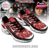 Red TN sneakers with bold Michael Jackson themed designs, crowned monogram on tongue, and dynamic striping accents!