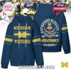 Navy hoodie with Michigan Wolverines graphics on front and bold skull helmet illustration with fan slogan on back!
