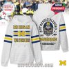 White hoodie with Michigan Wolverines graphics and statement skull helmet artwork for bold fan style!