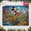 Cover of the 2026 Disney calendar featuring the main characters in a fairy-tale landscape with castle spires, waterways, and golden detailing around the title.