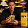 Man holding Missouri Tigers whiskey glass at bar with gift box!