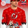 New Jersey Devils Bluey Night hockey jersey close-up featuring team crest and cartoon design!