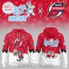 A red New Jersey Devils hoodie showing Bluey characters on the front and a large Bluey design on the back with hockey details!