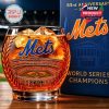 Mets whiskey glass with engraved Citi Field design bold team lettering and a solid base shown with a matching collector box in a stadium inspired setting!
