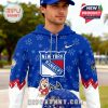 A blue and white hoodie showing the New York Rangers logo, Bluey cartoon characters in hockey uniforms, and decorative paw prints!