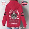 Detailed look at the hoodie’s back design: skull with football helmet, university logo, and bold text for sports fanatics!