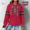 Red quilted hoodie with Ohio State Buckeyes skull logo printed on the front, worn by a female model with casual jeans!