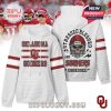 Black hoodie with bold Sooners pride—football-themed graphics, textured comfort, and standout sleeve details!