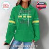 Female model in Oregon green hoodie with team branding, kangaroo pocket, and stylish sleeve details!
