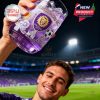 Hand raising purple Orlando City SC whiskey glass with ice under bright stadium lights!