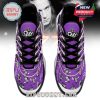 Top view of Ozzy Osbourne purple sneakers with repeating cartoon skulls, central logo, and black lace structure!