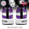 Rear view of Ozzy Osbourne sneakers with cartoon skull print, white cross strap, and black central pull tab!