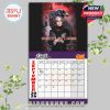 March 2026 calendar page featuring Ozzy with a bat and roses in a rock-inspired graphic!