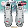 Top view of holiday sneakers showcasing custom team artwork and festive elements!