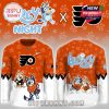 Full view of orange long sleeve cartoon hockey fan shirt with playful character design!