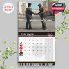 June calendar showing the surreal photo of a flaming handshake and the text 'The lunatic is on the grass', capturing Pink Floyd’s dark artistry!