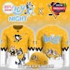 Front and back view of yellow hockey jersey and matching cap with cartoon characters!