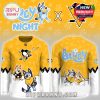Full design view of yellow Bluey Night hockey jersey with team logo and character art!