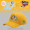 Yellow hockey fan cap with cartoon characters and team logo detail!